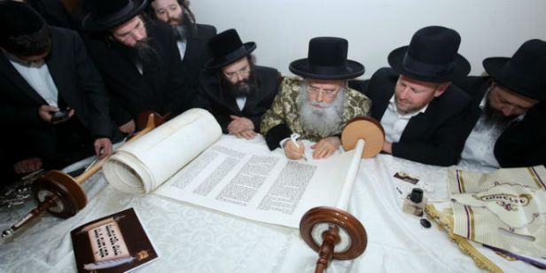 Yosef Berger writing.jpg